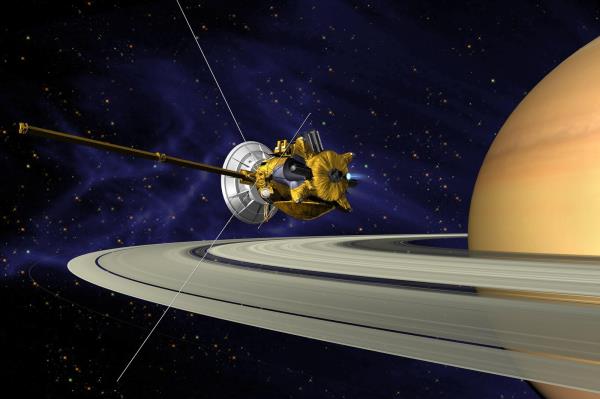 This is an artist’s co<em></em>ncept of NASA's Cassini spacecraft during the Saturn Orbit Insertion (SOI) manoeuvre, just after the main engine has begun firing. PHOTO: COURTESY/NASA