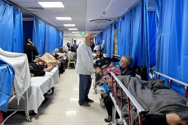 Patients and internally displaced people are pictured at Al-Shifa hospital in Gaza City on Nov10, 2023, amid o<em></em>ngoing attacks by Israel. (Photo by Khader Al Zanoun / AFP)